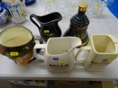 Three whisky advertising water jugs, Wade Bells whisky decanter for Christmas 1992 and a Royal