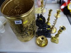Repousse brass brolley stand, two pairs of brass candlesticks etc