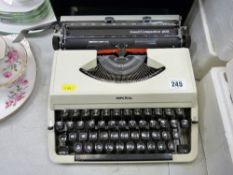 Portable Imperial typewriter in carry case