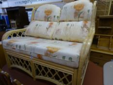 Bamboo two seater conservatory couch with upholstered pads