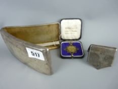 Silver cigarette case, a white metal matchbook holder and a star shaped enamel decorated pendant
