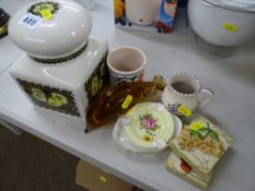 Vintage biscuit jar, two Poole pottery items, glass dolphin ornament etc