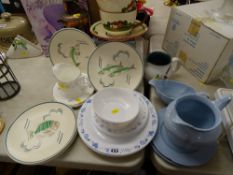 Denby 'Green Wheat' jug, two very large Devon ware cups, five Poole pottery fish decorated plates