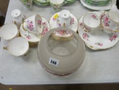 Twenty one piece hand painted rose and gilt edged Shelley teaset with a vintage style lamp globe