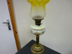 Victorian oil lamp with painted glass font and etched shade on a brass reeded column base