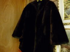 Two vintage fur style jackets