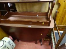 Mahogany effect dining table and four chairs with a similarly styled coffee table