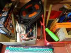 Box with Black & Decker heatgun, small vacuum cleaner, extension reel and a red tub with flat hose