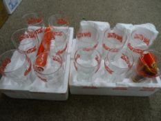 Twelve Coca Cola advertising glasses