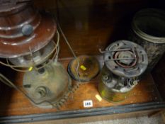 Vintage Tilley style lamp and a portable gas stove in container