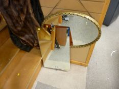 Gilt framed oval wall mirror and one other
