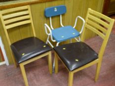 Pair of light wood dining chairs with leather effect seats and one other