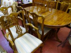 Quality modern honey pine extending dining table and six (four plus two) dining chairs with drop-