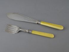 A PAIR OF VICTORIAN SILVER & IVORY HANDLED FISH SERVERS, the blades stamped Sheffield 1894, 6.6 troy