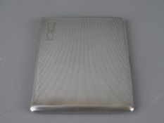 A SILVER CIGARETTE CASE by Garrard & Co, London 1957, 6.4 troy ozs, 11.75 cms (monogrammed)