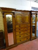 A VICTORIAN MAHOGANY INVERTED BREAKFRONT COMBINATION WARDROBE, 209 cms high, 240 cms wide, 65 cms