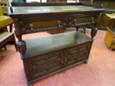 A VINTAGE OAK DUMB WAITER, 111 cms high overall, 122 cms wide, 51 cms deep