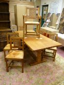 A ROBERT 'MOUSEMAN' THOMPSON ADZED TOP REFECTORY DINING TABLE and six (four plus two) lattice back