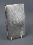 A SILVER CIGARETTE CASE, Birmingham 1937, 14 cms long, 6.6 troy ozs
