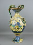 AN ITALIAN CANTAGALLI MAIOLICA BALUSTER SHAPED VASE having twin double snake handles (losses and