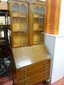 A POLISHED 1930's BOOKCASE BUREAU with three drawer base, 190 x 76 cms