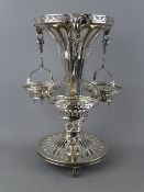 A GOOD SILVER TABLE CENTREPIECE, London 1907, of pierced trumpet form on triple open support and