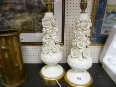 Pair of pottery cream ware floral table lamps (some damage)