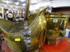 Brass helmet shaped coal scuttle and a circular coal scuttle