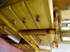 Reproduction pine bedroom suite of pedestal dressing table, stool, triple mirror and two bedside