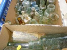 Two boxes of old soda and similar bottles