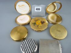 Collection of lady's compacts including a white metal Art Deco example