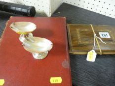 Two EPNS based shell dishes, an olive wood Jerusalem album of pressed flowers and a red covered
