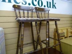Two oak effect bar stools