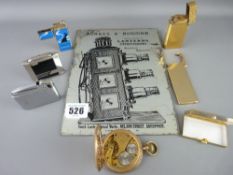 Nokes & Norman advertising mirror for Cinematograph Lanterns, a selection of vintage lighters and