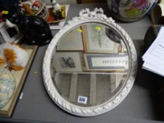 Bevelled glass oval wall mirror with garland decoration