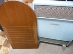 Vintage electric heater and a shove ha'penny board