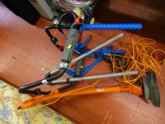 Car bicycle rack and a Flymo Contour strimmer E/T