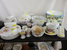 Porcelain and pottery tea and breakfastware, floral encrusted planter etc