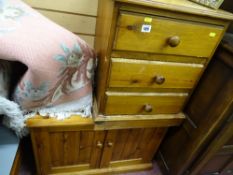 Modern pine three drawer bedside chest and a two door storage cabinet