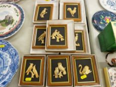 Eight framed metallic bird sculptures by Susan Norton, plated with 24 carat gold