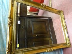 Modern gilt framed wall mirror