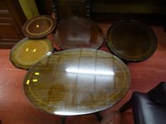 Parcel of three oval and inlaid side tables and a leather tooled top wine table etc