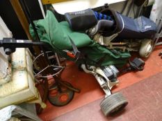 Electronic golf trolley and bag of golf clubs along with another bag of golf clubs E/T