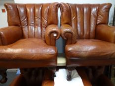 Pair of tan club armchairs