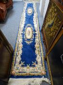 Blue floral runner with tassel ends