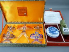 Boxed set of Oriental paper kites in miniature and a cased porcelain pot and cover with a carved