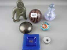 Three glass paperweights, an Inuit type carved figure etc