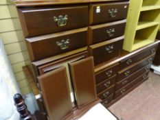 Mahogany effect bedroom suite of two x four drawer chests, twin three drawer bedside chests,