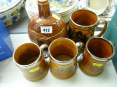 Carltonware Beneagles Scotch whisky flask, two McMillan & Co coaching tankards and two others