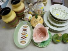 Pair of German pottery vases, three graduated jugs and a mixed selection of pottery tableware